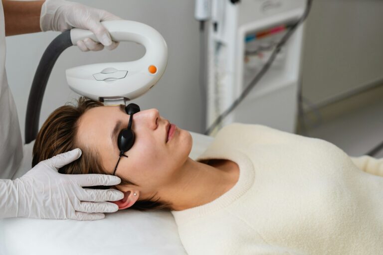 Phototherapy, photorejuvenation, IPL in a beauty salon. Care for a woman's face.